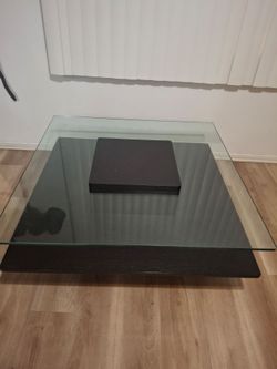 Glass coffee table