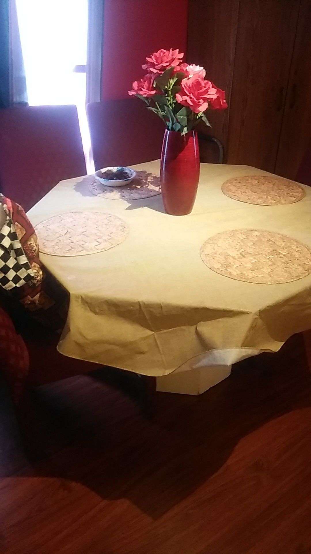 8 sided Octagon glass dining room table with 4 burgandy cloth high back chairs. 4feet wide by p29 inches in h8. Asking $100.00. {contact info removed}