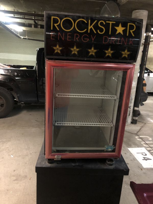 Mini rockstar fridge with stand works well for Sale in Long