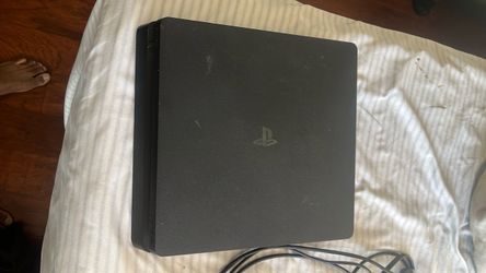 I am selling my my PS4 my controller, my headset and my game