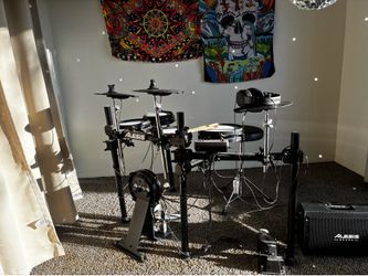 Alesis electronic drum kit with mesh heads