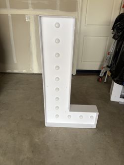 Marquee letter L with lights