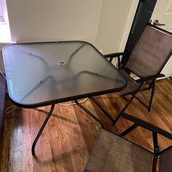 Glass Table And Foldable Chairs