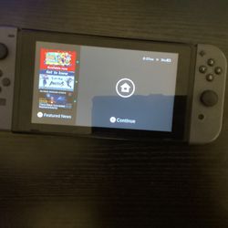 Selling Nintendo Switch With Grey Controllers And A 400gb SD card
