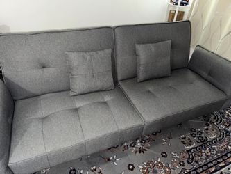 Sofa Bed with 2 small pillows
