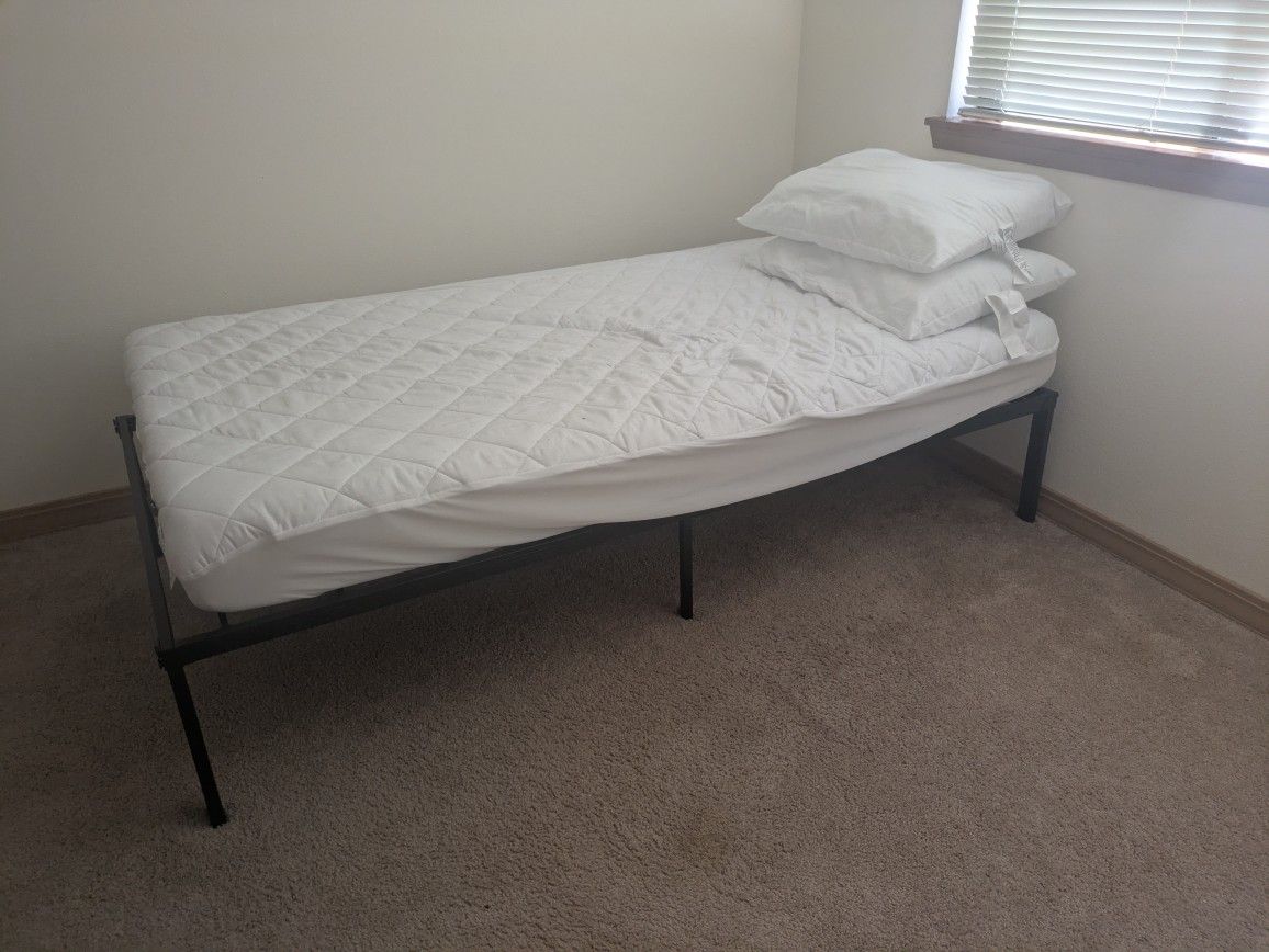 Twin Bed Frame With A Mattress