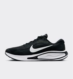 black and white Nike Journey Run road running shoe.
