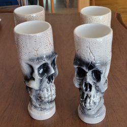 Spirit Halloween set of 4 ceramic skeleton tumbers. New, never been 
used. 
