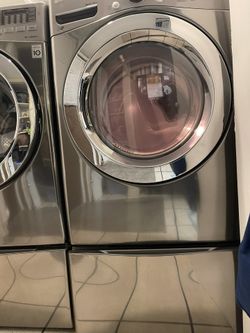 LG 4.3 cu. ft. ultra-large capacity front-load washing machine & Gas Dryer