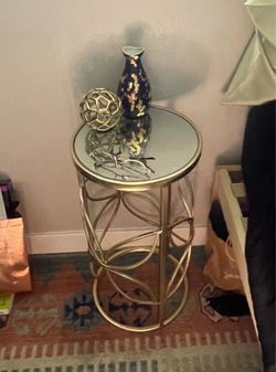 small table with mirror top