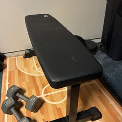 Weight bench, barbell, 20 lb weights