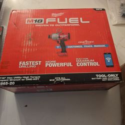 Milwaukee 7/16 utility impact wrench with attachments