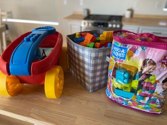 Lego Duplo car with a lot blocks