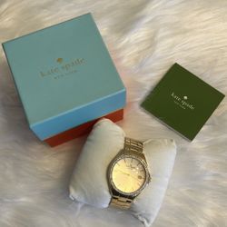 KATE SPADE SEAPORT GRAND DATE GOLD-TONE ST. STEEL WOMEN'S WATCH 1YRU0102