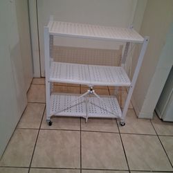 Shelf  Cabinet  With Weel ,foldable, Light WIGHT, Stainless With White Solid Color, Hight 31" Inches,long 26" Inches, Width 12 " Inches and Very Light