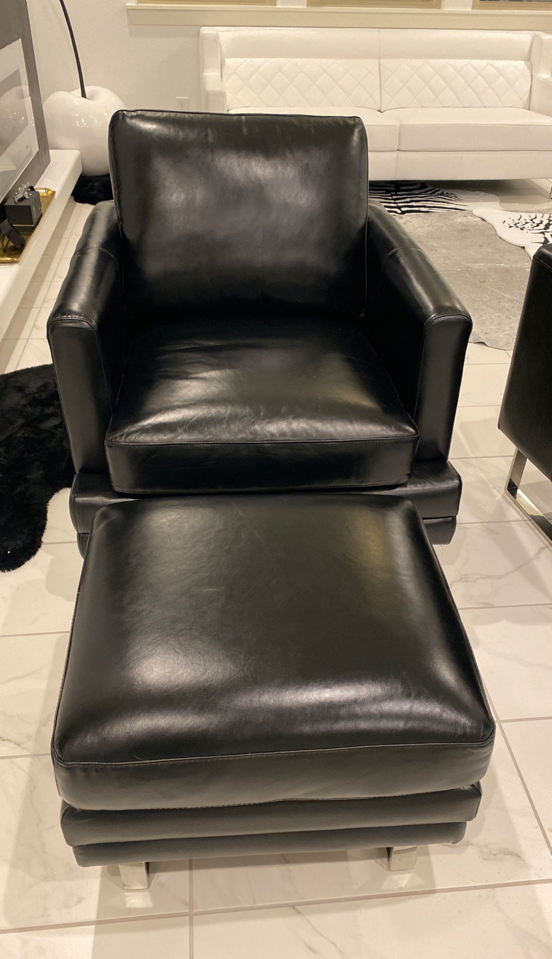 100 % leather accent chair and ottoman brand new