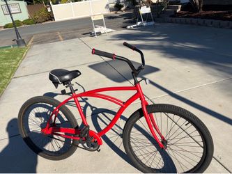 Beautiful flat red beach cruiser