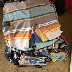 A Pile Of  Board Shorts, All Major Surf Skate Company Brands