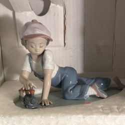 Lladro Boy With Train Figurine 