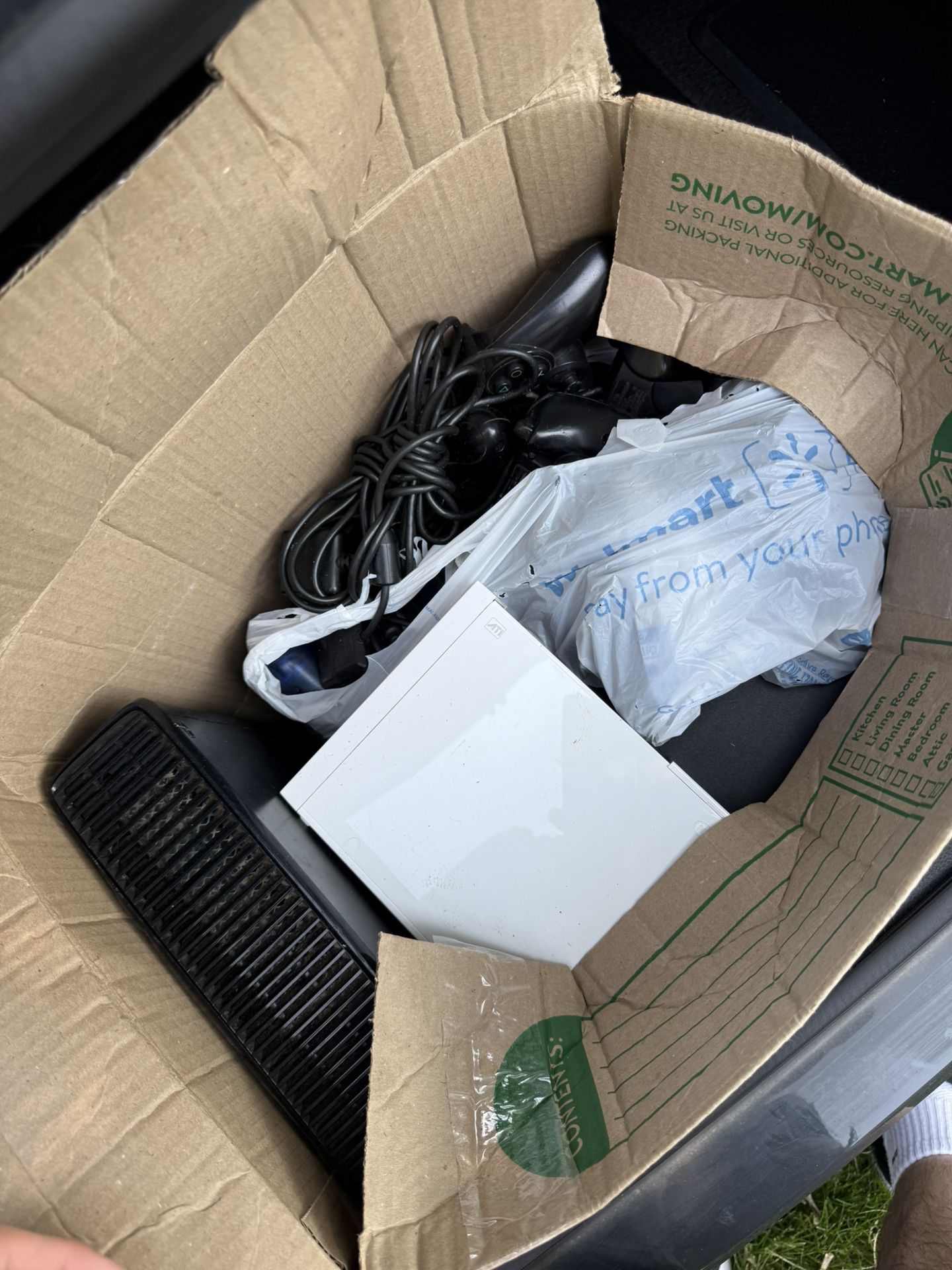 Box of old consoles