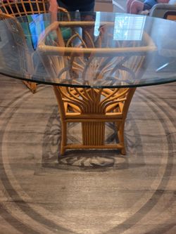 Rattan table with glass top