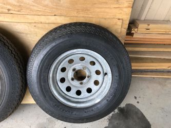 New 14” 5 lug galvanized trailer rim and tire
