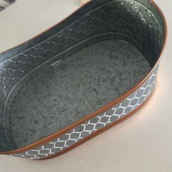Oval long galvanized barrel  Harry & David Accents/ Colors: silver/white & gold.