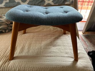 Blue tufted ottoman/stool/ footstool with wooden legs