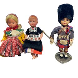 Vintage Dutch Girl" doll, likely from the mid-20th century, vintage 1960s Scottish boy doll and vintage Swedish doll from the 1970s, specifically most