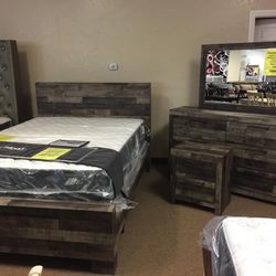 Derekson Gray Panel Bedroom Set (Queen and King Bed