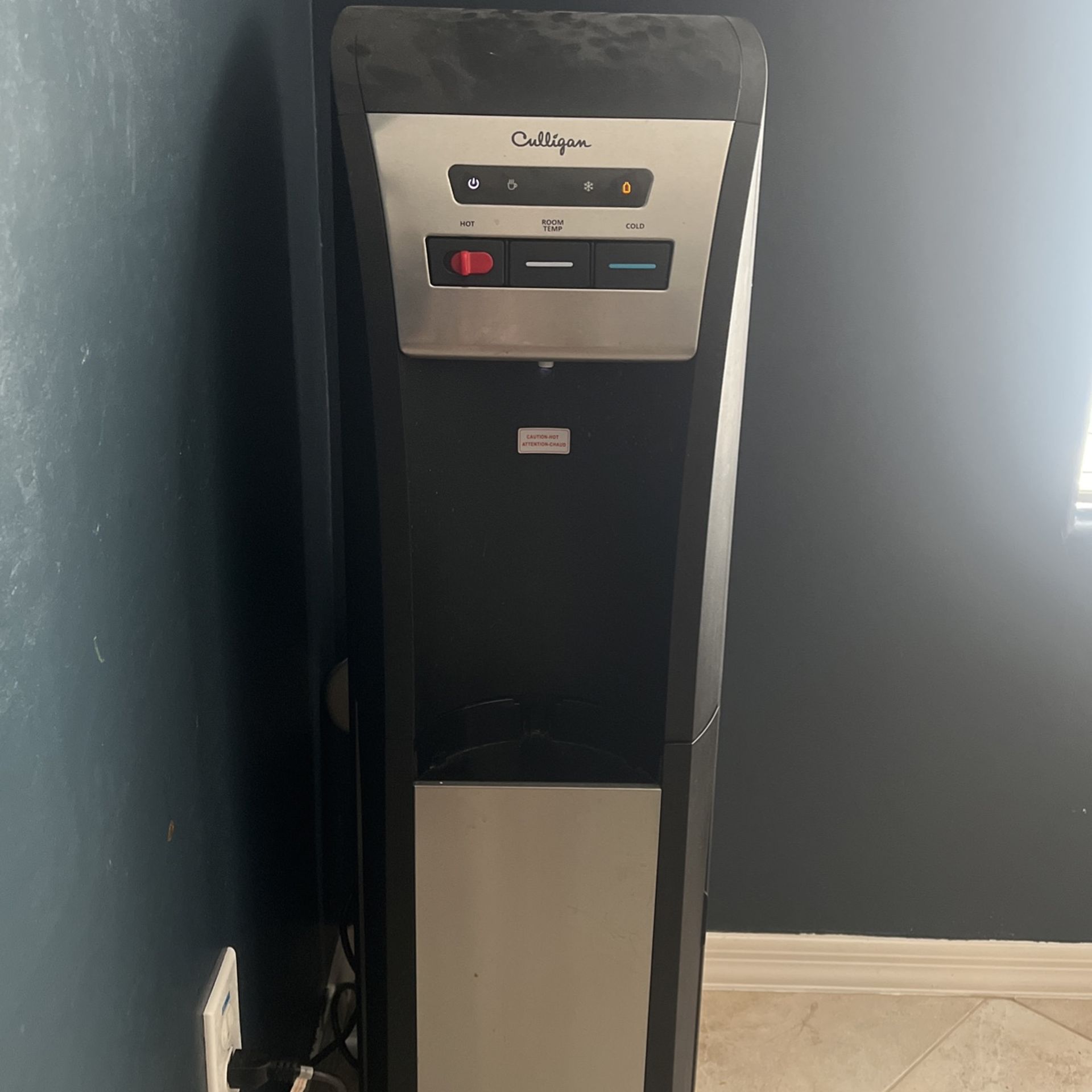 Culligan Water Dispenser And 5 Gallon Bottles