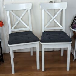 White IKEA Ingolf Dining Chairs with Blue Cushions | Kitchen Furniture $45 each chair