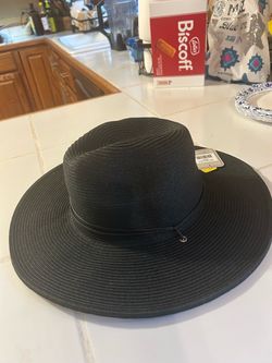 black wide-brim woven straw fedora or sun hat with a slim band detail, resembling styles like the San Diego Hat El Campo Sun Hat