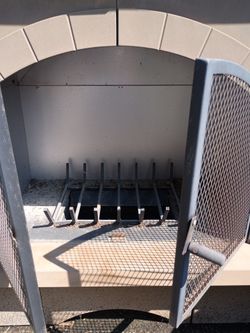 Outdoor Fireplace with Metal Mesh Doors