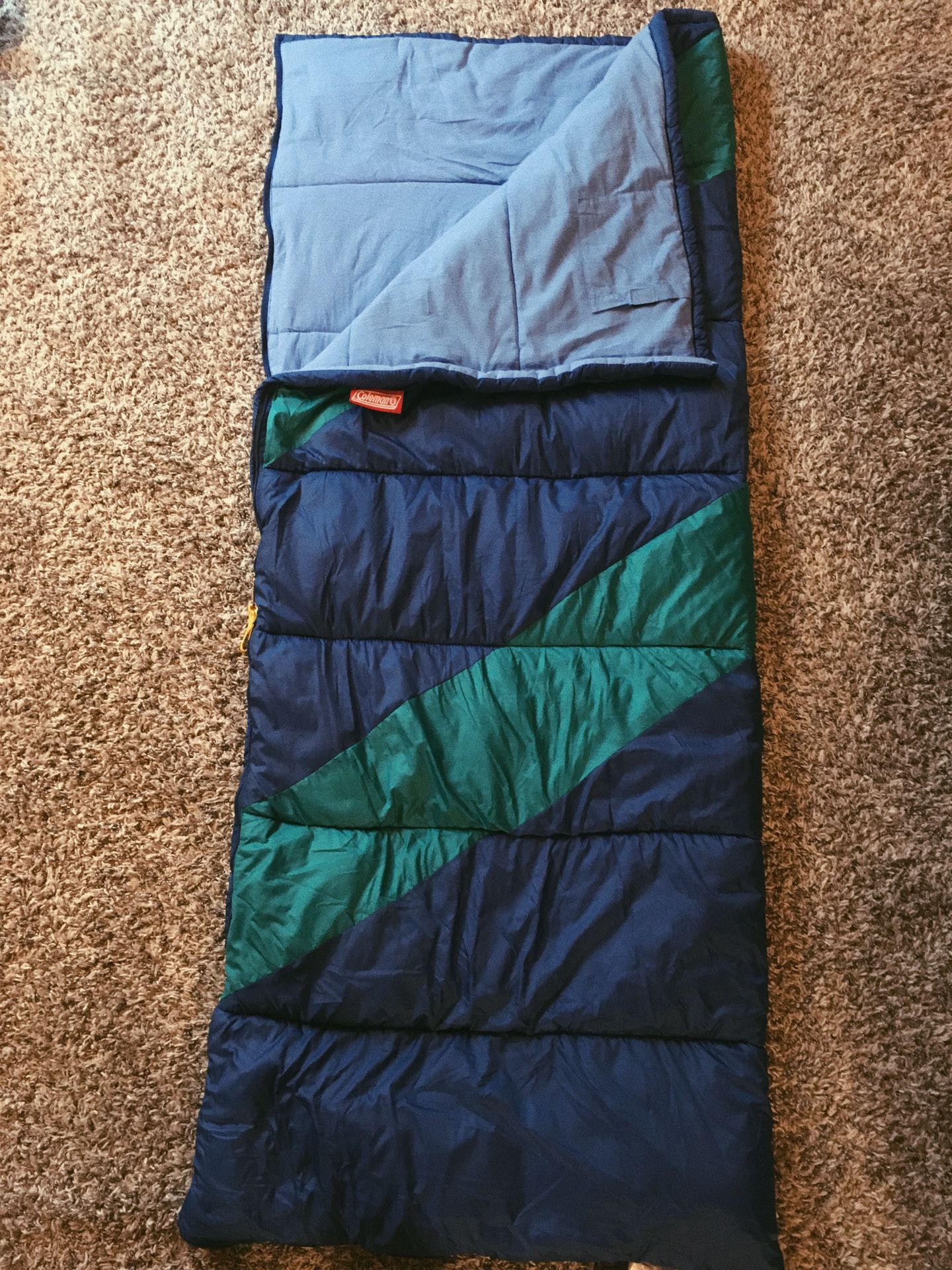 Blue/Green Coleman sleeping bag