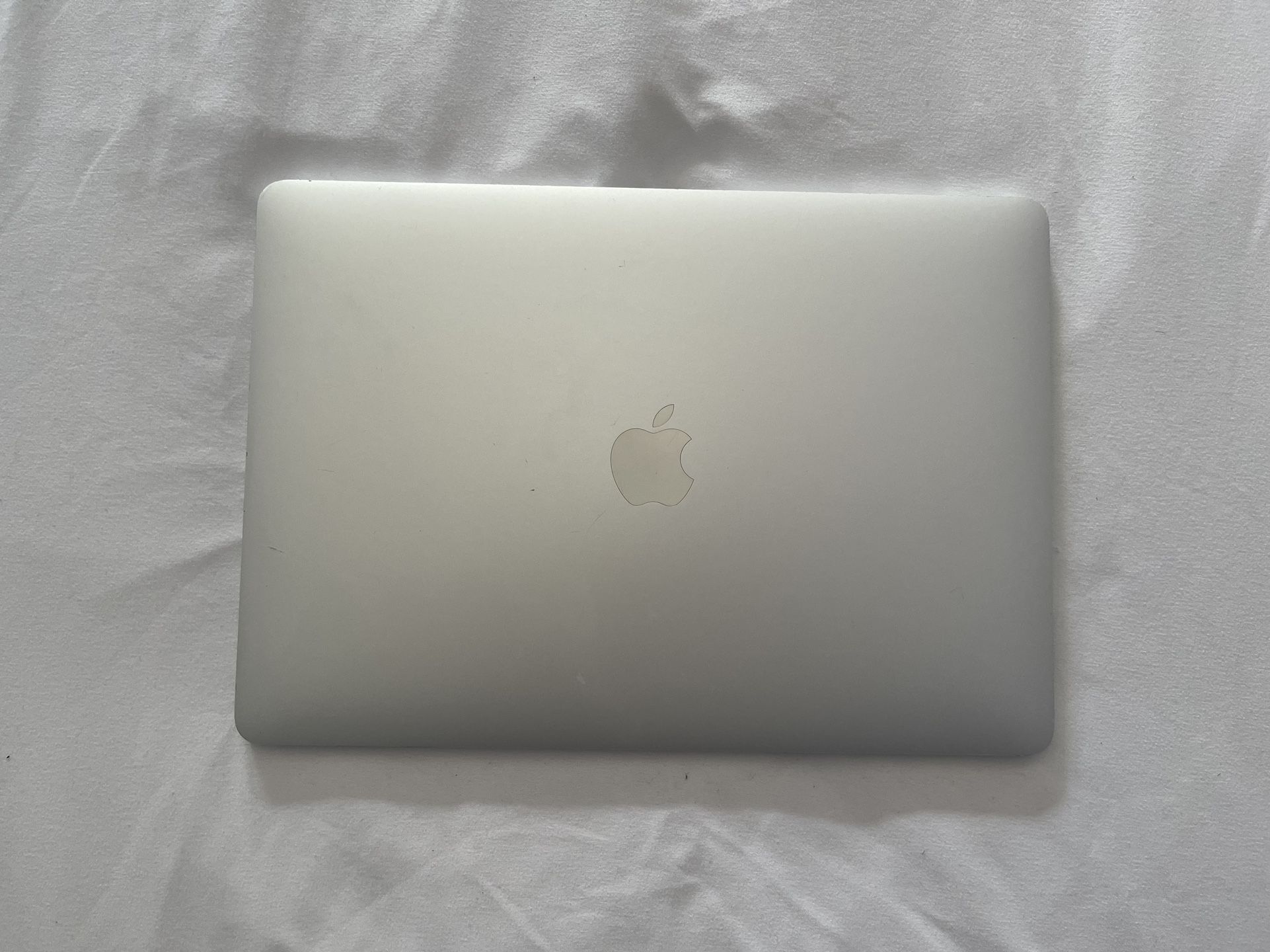 Silver MacBook Pro with Touch Bar