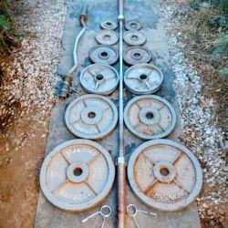 245lbs Olympic Weights+ 7ft Olympic bar + Curl bar with clips