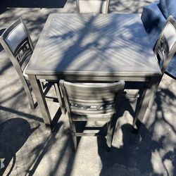 Table and 4 chairs