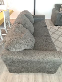 1 gray sofa, 1 gray loveseat, 1 rug