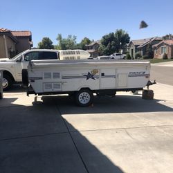 1998 Starcraft Spacestar tent trailer with slide out and toilet/shower
