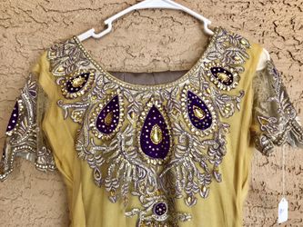 Dresses with stones and pearls.