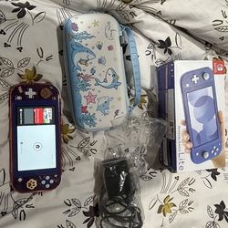 BARELY USED Blue Nintendo Switch Lite - comes with box and accessories