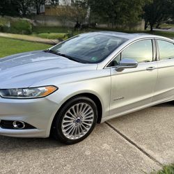 🚗🔥 2014 Ford Fusion Hybrid Titanium – Fully Loaded- Clean Title – New Tires 
