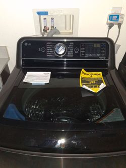LG 5.5 Cu. Ft. Mega Capacity Smart Wi-Fi Enabled Top-Load Washer,