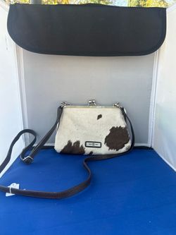 hair-on-cowhide kisslock frame crossbody bag