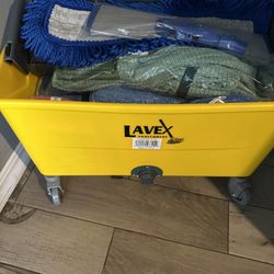 Mop Bucket With New Towels 