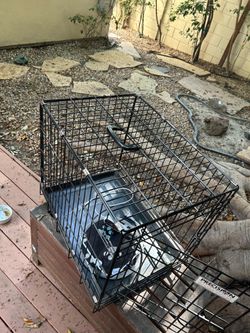 Free med size pet cage and cat house