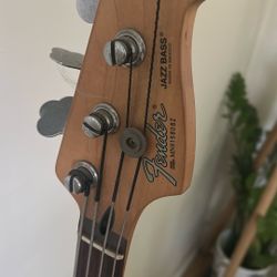 Fender Jazz Bass, Amp, Stand, and 3-string Cigar Box Guitar