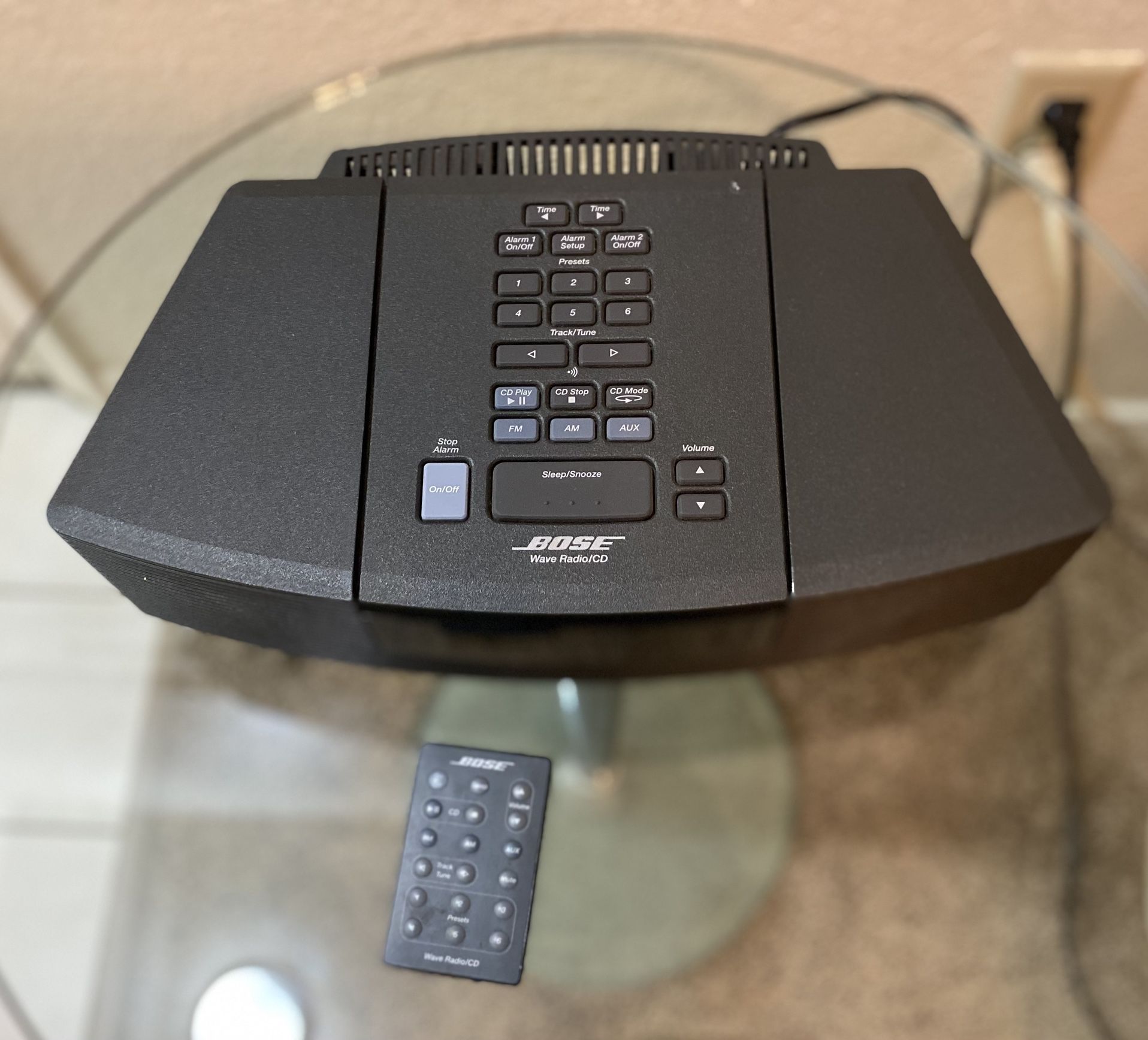 Bose Wave Radio Cd Player with Remote Control in excellent condition.