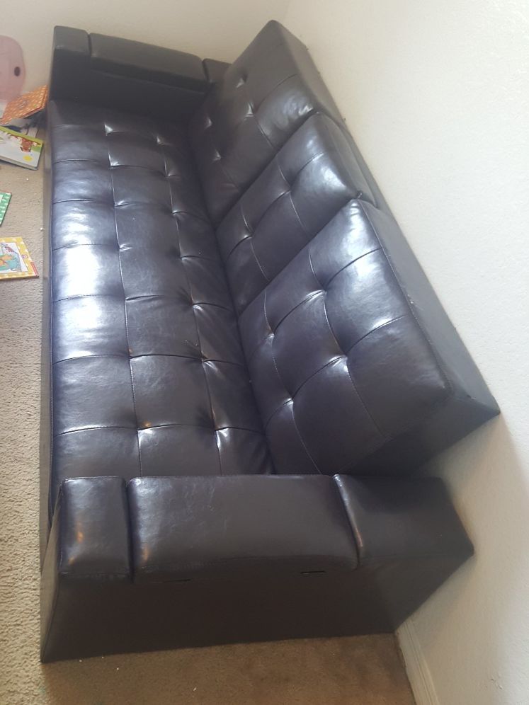 Leather Futon (bed/couch). Great condition. Pick up.